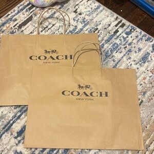 2 coach shopping bags empty